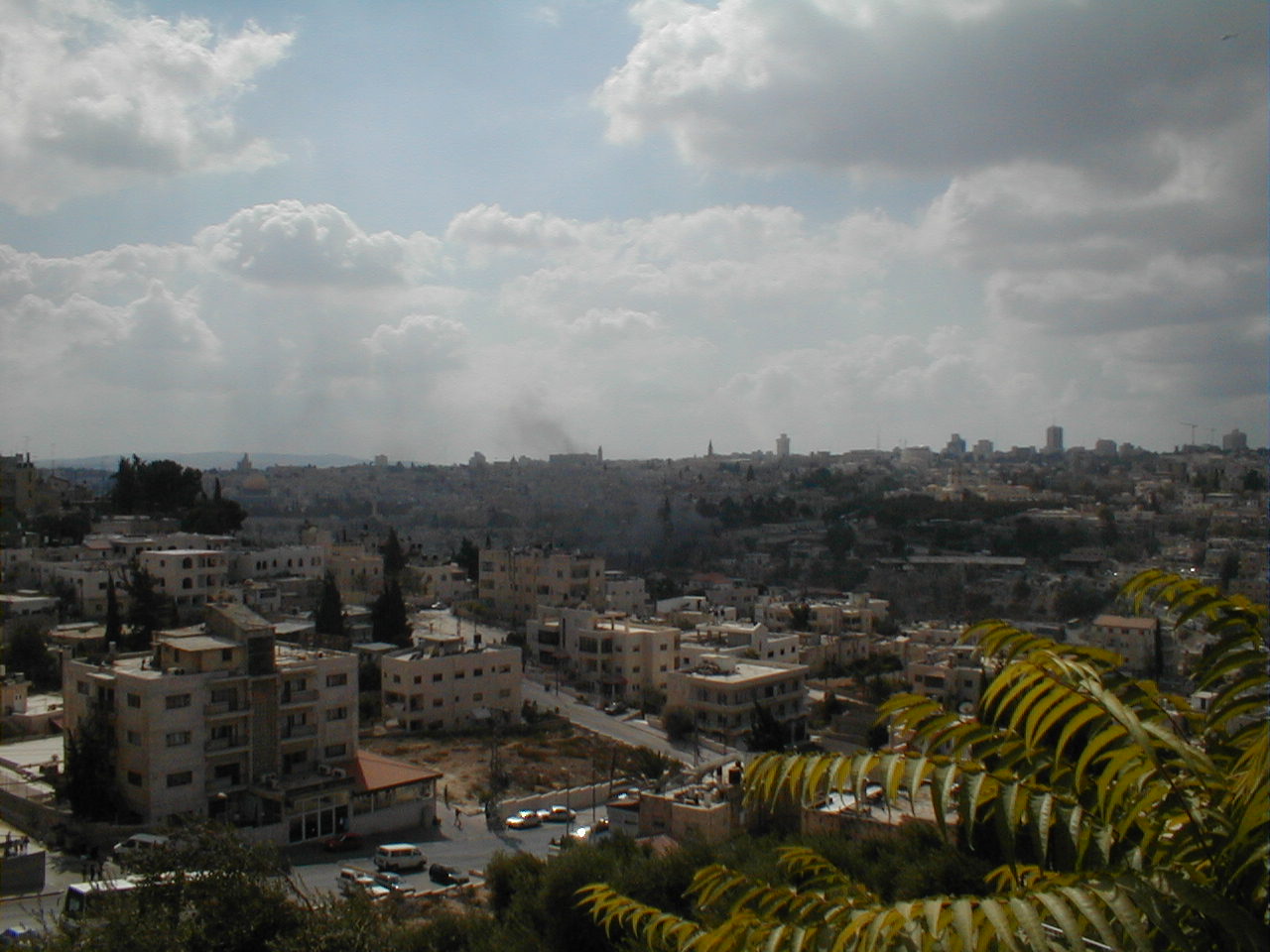 Old City with burning car.JPG